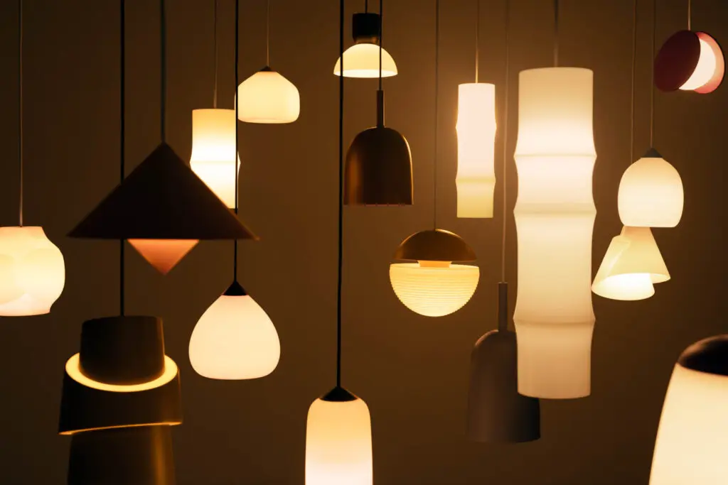 a collection of pendant lights glowing