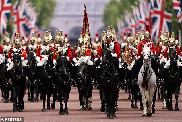 Members of the Household Cavalry ride on horseback as they take part in the Major General's Review rehearsal for Trooping the Colour, on June 1