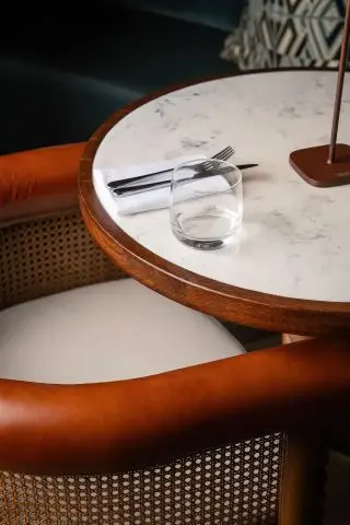 curved chair and small table