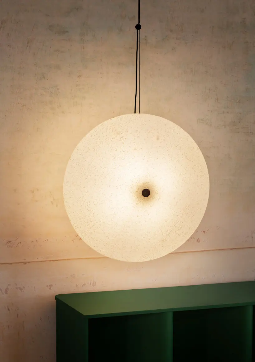 lunar surface-inspired lamp by e-ggs x miniforms gently illuminates interiors