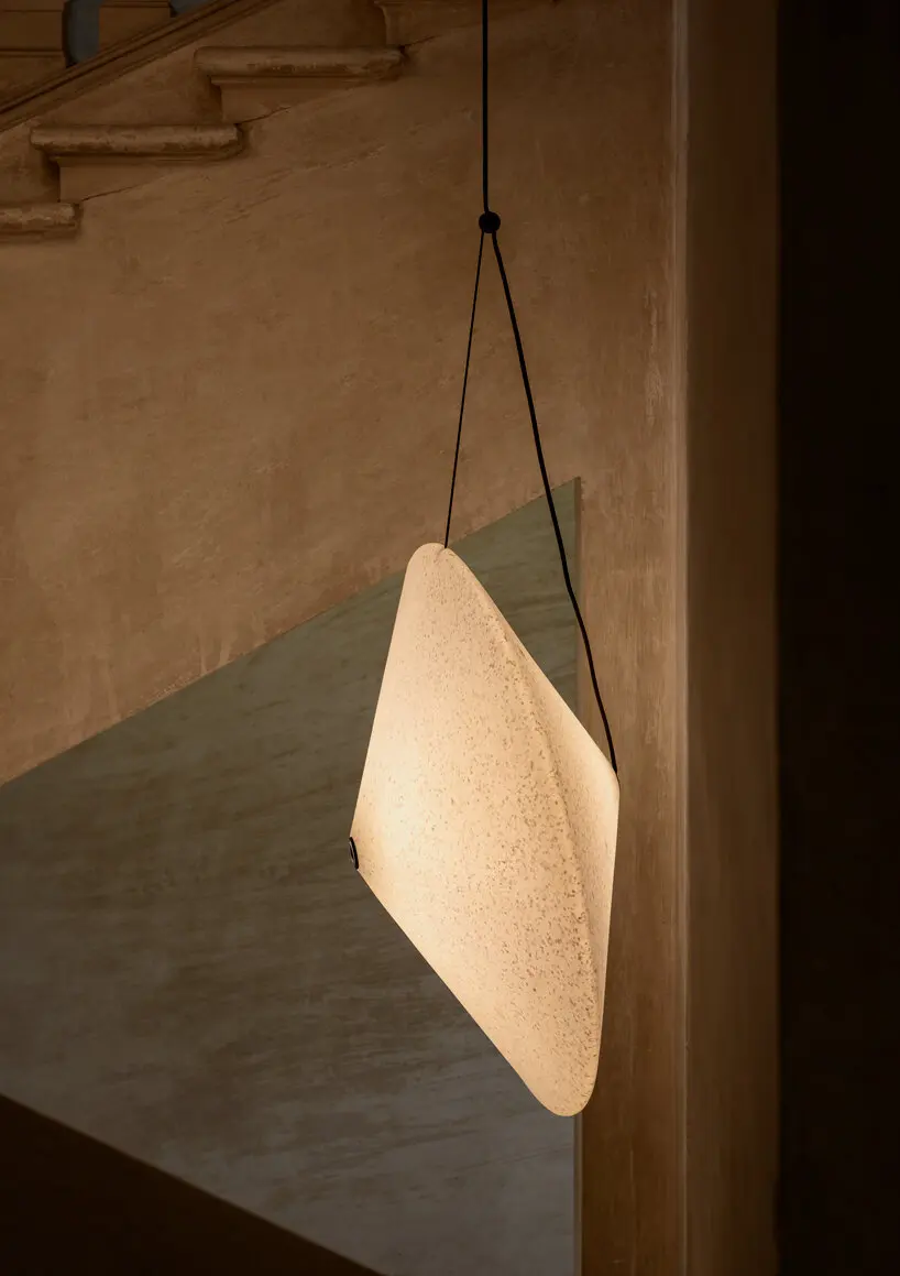 lunar surface-inspired lamp by e-ggs x miniforms gently illuminates interiors