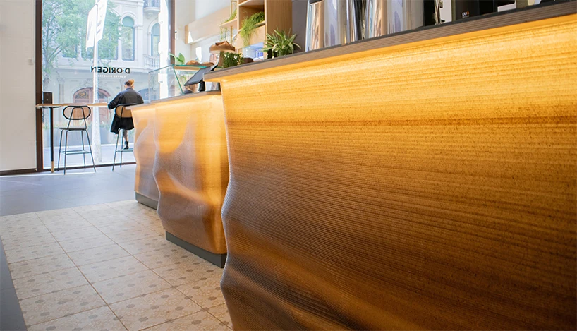 coffee waste turns into 3D printed furniture decorating d·origen coffee shop in barcelona