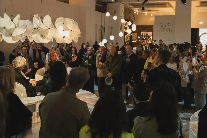 A large crowd assembled around a talk