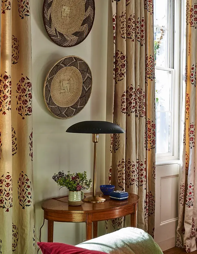 Always mix old with new. A contemporary lamp from Julian Chichester works well with vintage woven baskets hung as artwork in Ireland’s home. ‘On the table are a Wedgwood box from the late Queen’s coronation, found at Shepton Mallet market; my mother’s glass-etched bowl and a modern coffee mug used as a vase,’ she says.