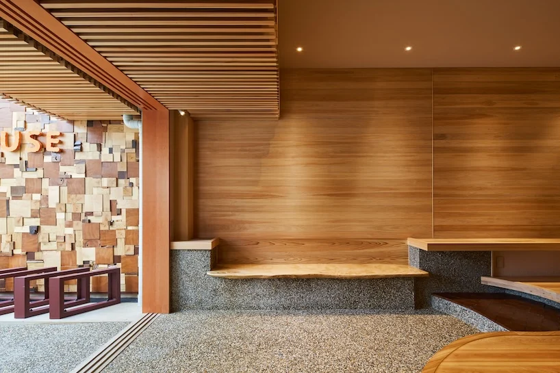 wooden louvers run along kyoto office space's entire interior by ujizono architects