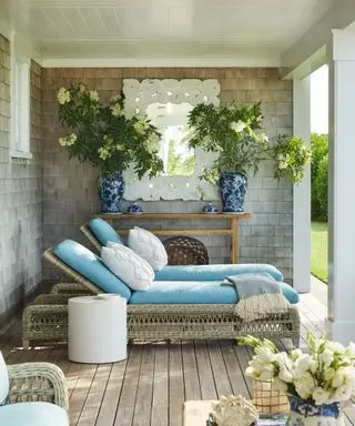 with white walls and blue cushions