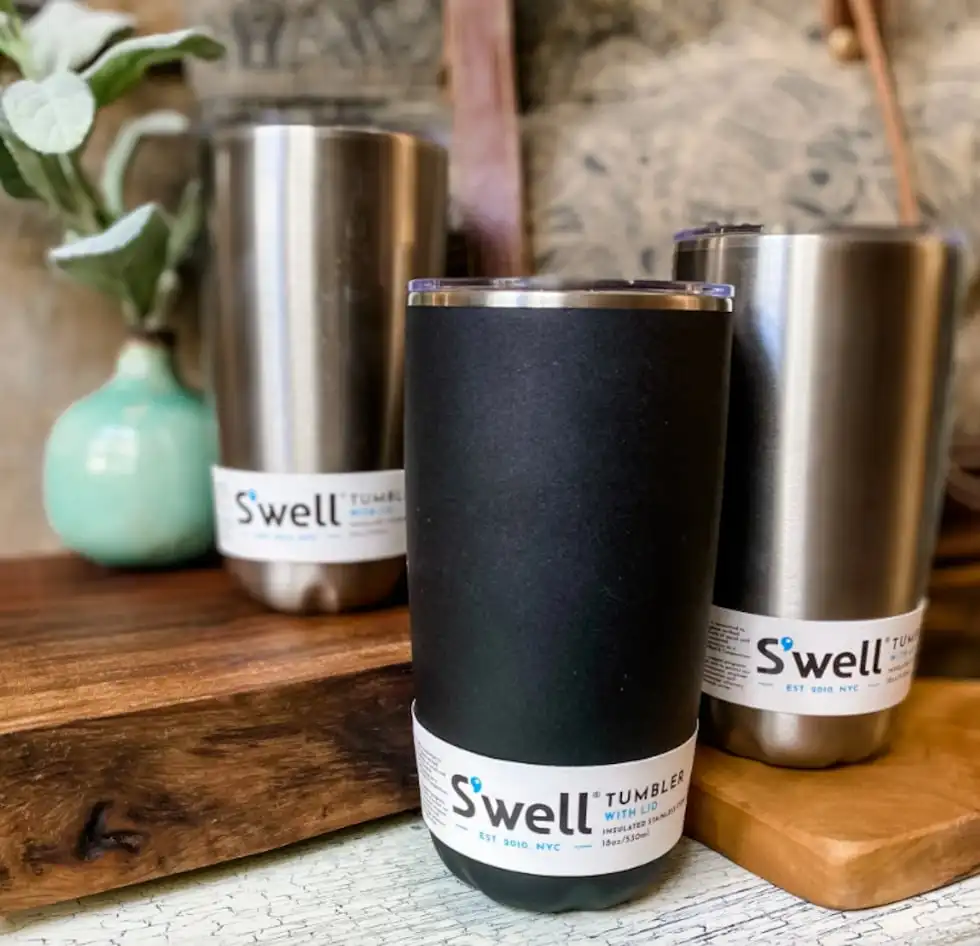 S'well Tumblers feature triple-layered, vacuum-insulated construction, designed to keep...