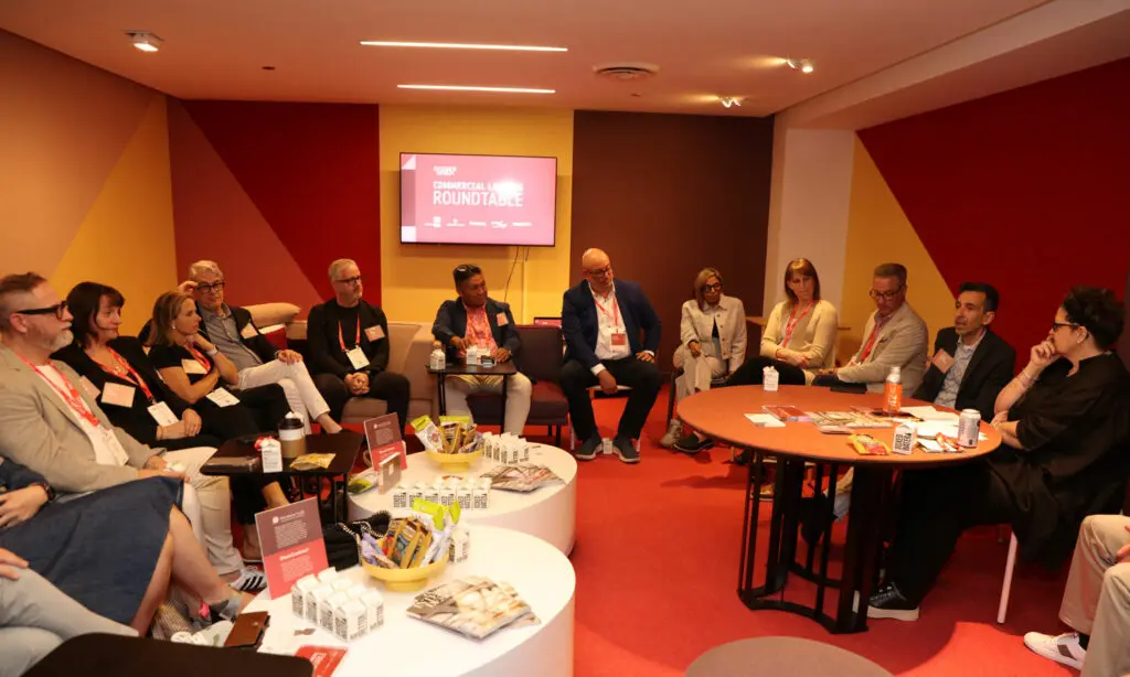 attendees gather during a roundtable at neocon