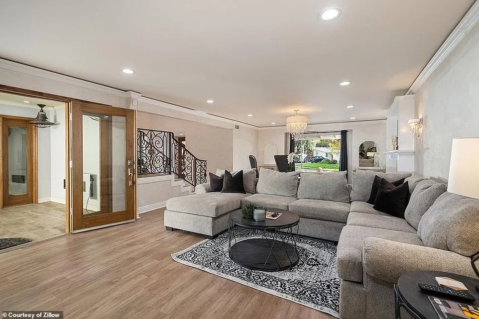 Interior photos from the online property listing had shown a large sectional that resembles the disassembled couch that was dumped outside