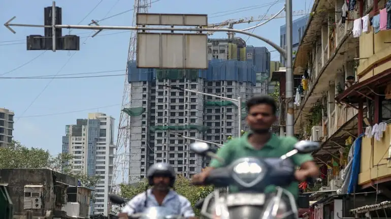 Residential buildings under construction in Mumbai, India, on Wednesday, June 5, 2024. For many foreign investors, Indias near-$400 billion stock-market wipeout on Tuesday is just another opportunity to buy into what they see as one of the world's most promising economies. Photographer: Dhiraj Singh/Bloomberg