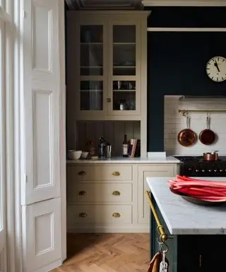 Taupe and dark green kitchen