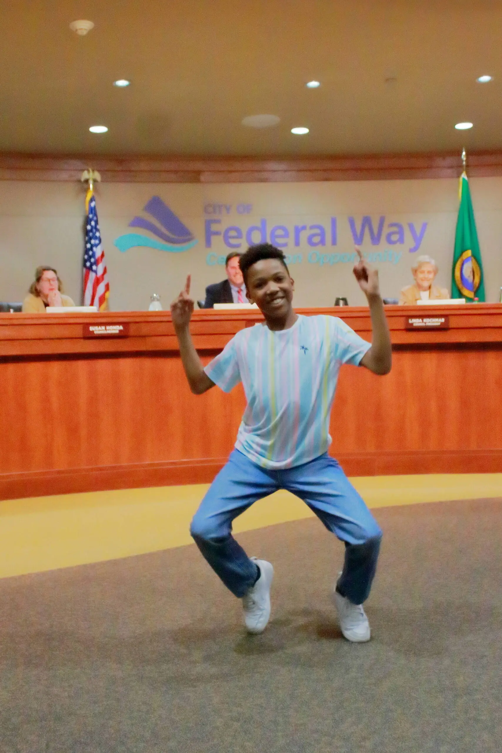 Jace Johnson performed a dance at the Federal Way City Council meeting after receiving an award of recognition for his role in X: The Life and Times of Malcolm X show at McCaw Hall by Seattle Opera.