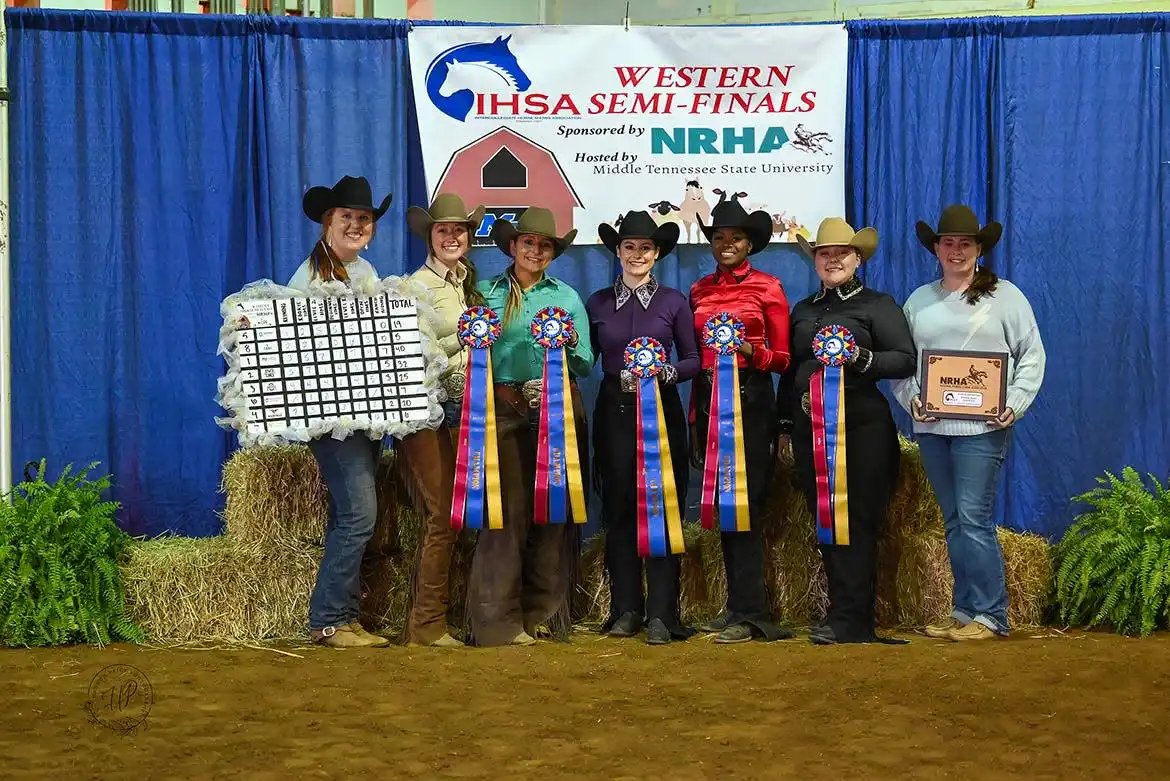 From left, Middle Tennessee State University horse group coach Ariel Higgins, riders Jordan Martin, Mackenzie Latimer, Simone Allen, Sadio Barnes, Monica Braunwalder and coach Andrea Rego are shown with their ribbons, earliest- place plaque and leading eight finishers ' standings board after winning the Intercollegiate Horse Shows Association Western Semi- Finals March 22- 23 at the Tennessee Livestock Center in Murfreesboro, Tenn. The Blue Raider riders ' team and seven individual riders advanced to the IHSA Nationals in Tryon, North Carolina, in early May, where they will defend the national title they won in 2023.