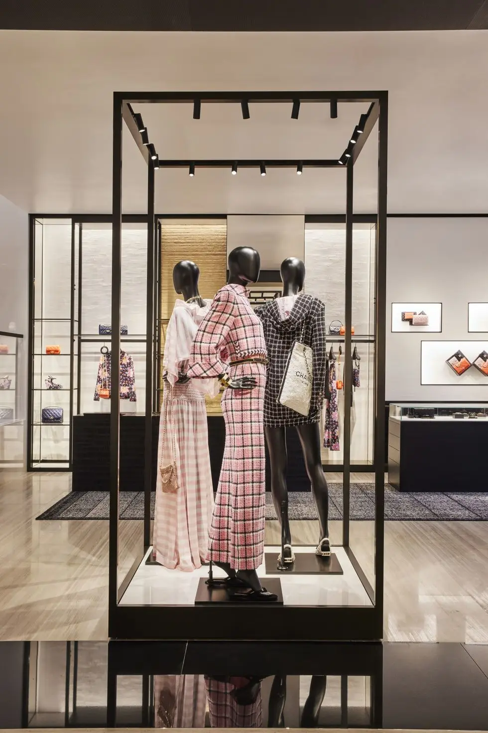 a group of mannequins in a display case