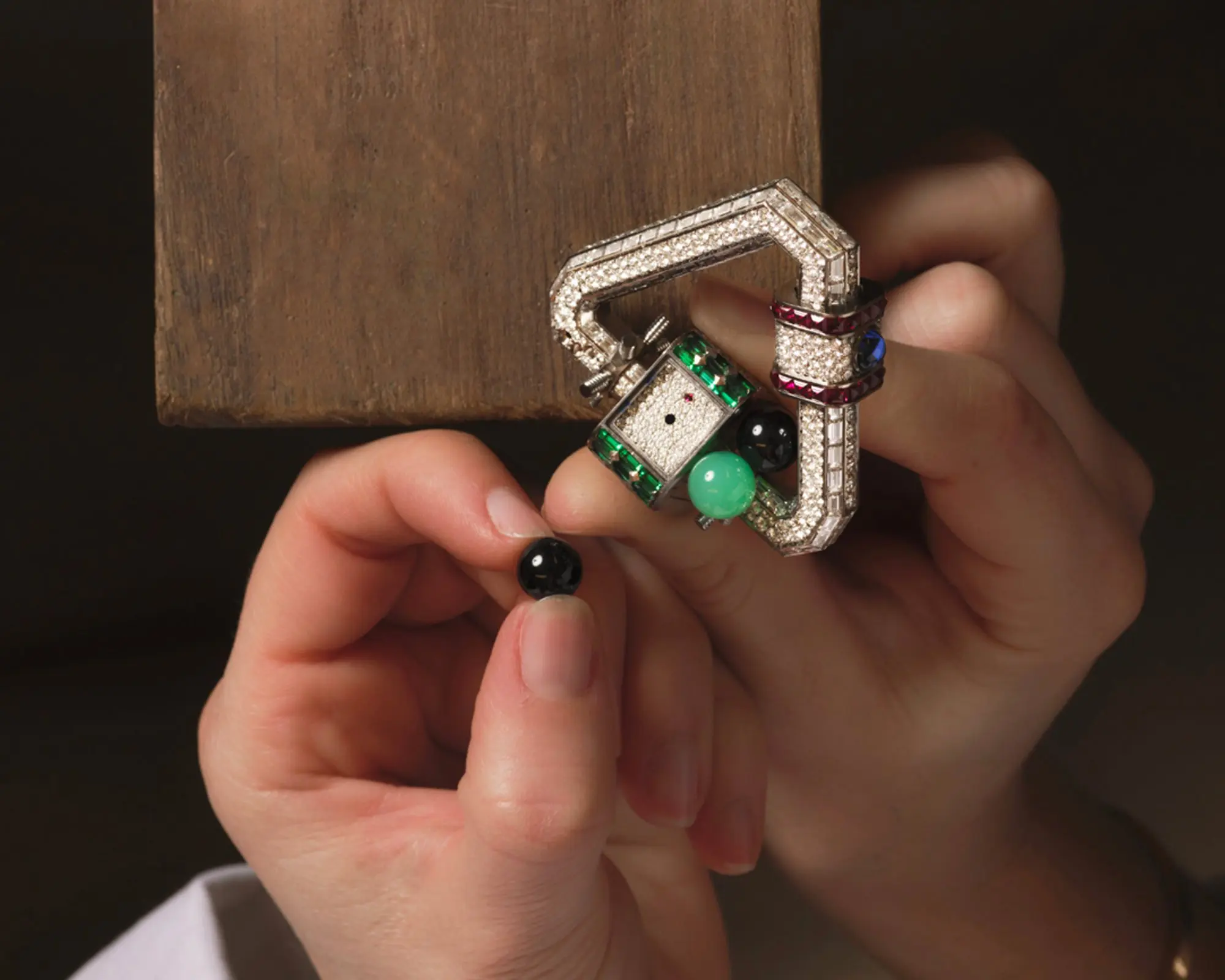 Cartier’s Polymorph carabiner also features a secret timepiece image