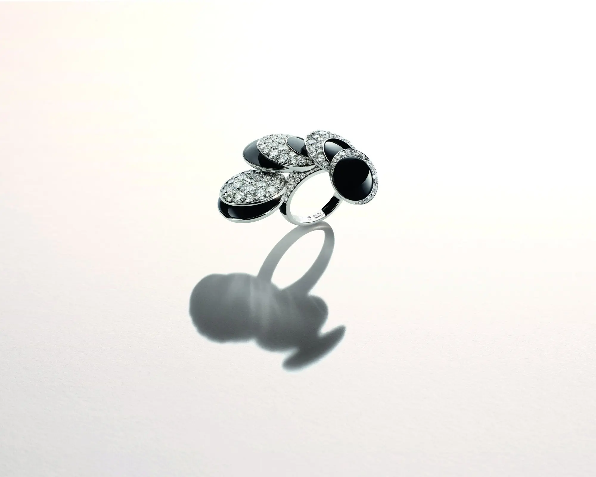 Cartier’s Polymorph ring evokes an eclipse image