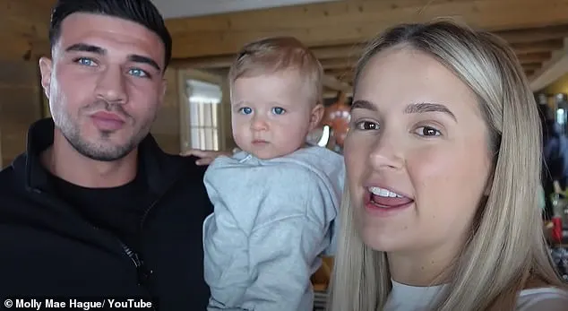 She posed with Tommy and their baby daughter Bambi, 14 months