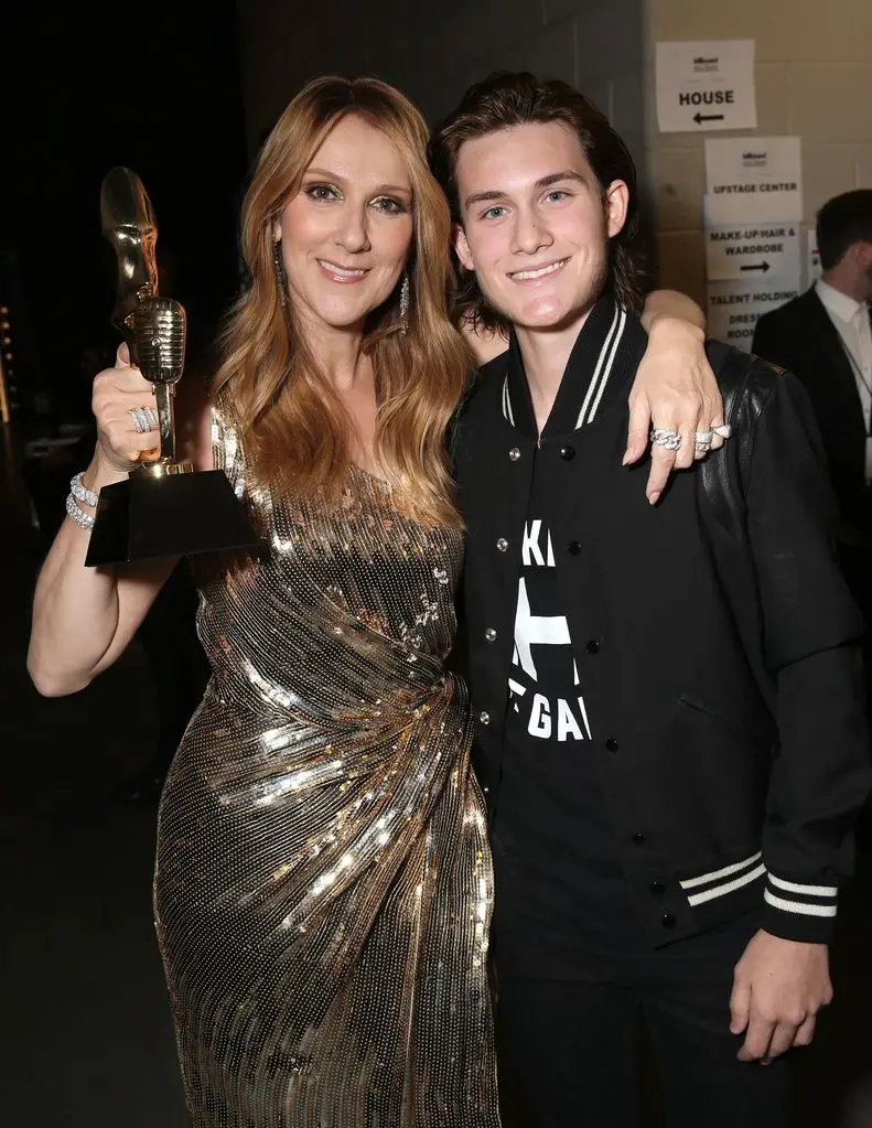 Celine Dion, recipient of the Billboard Icon Award, and son Rene-Charles Angelil backstage at the 2016 Billboard Music Awards at the T-Mobile Arena on May 22, 2016 in Las Vegas, Nevada.