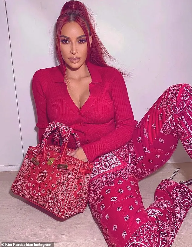 Kim Kardashian owns a custom red bandanna bag from Hermès - while her sister, Kylie, owns a similar design in white