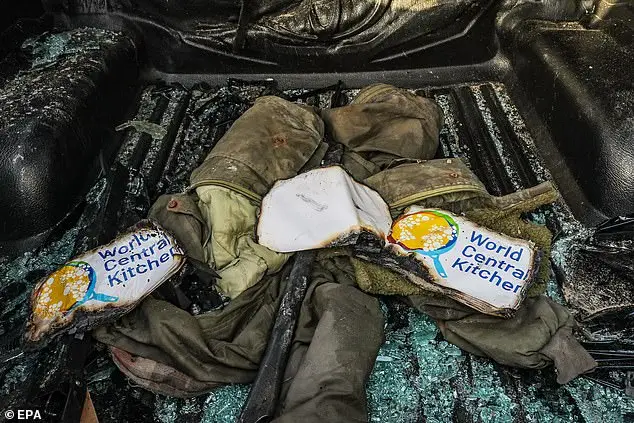 Clothes of members of the World Central Kitchen are seen inside their destroyed car