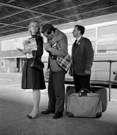 Jane Fonda, carrying a Chanel bag, with her husband Roger Vadim, 1965