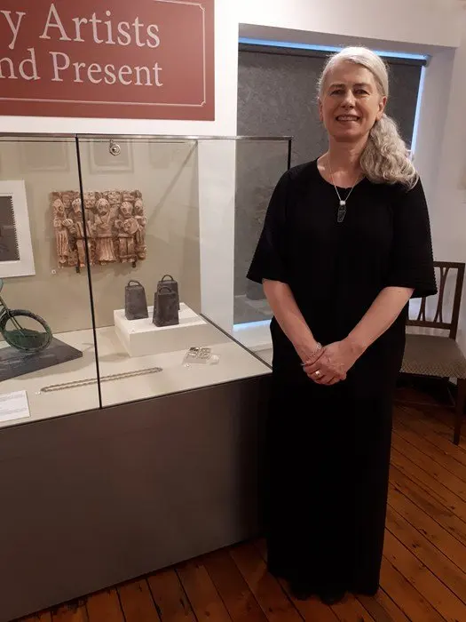 Céline Traynor pictured with her work on display at Newry and Mourne Museum. Newry and Mourne Museum Collection