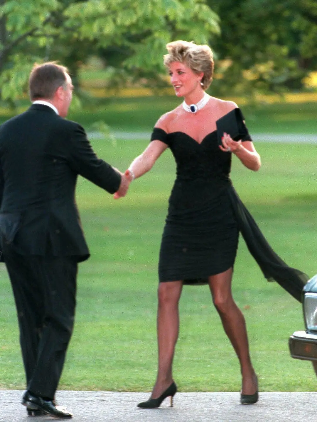 Diana, Princess of Wales, attends the Vanity Fair party at the Serpentine Gallery wearing the famous black 