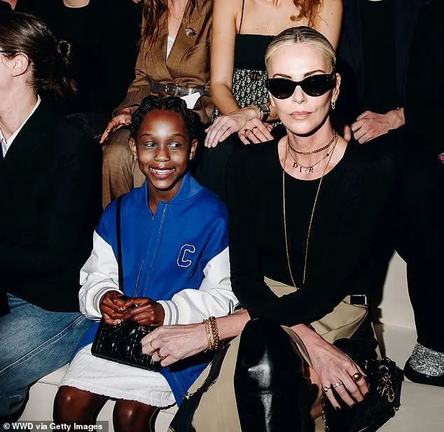 The mother-daughter duo wore matching black purses from the luxury fashion house