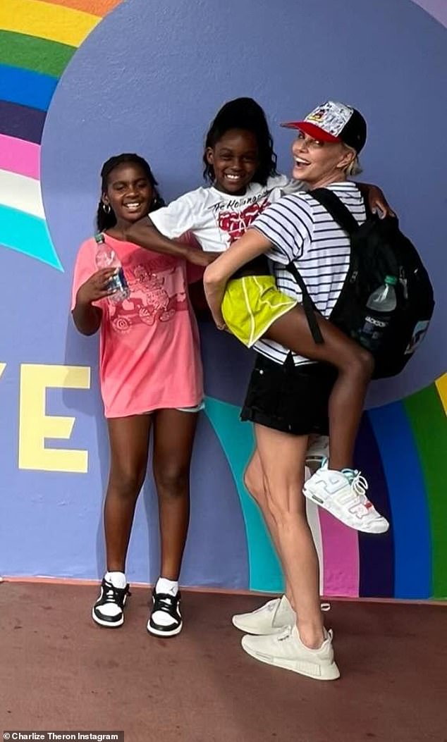 Two weeks ago, Theron brought along August and Jackson, 11, to Disney World as seen in an Instagram post of their vacation, which she captioned: 'Spring break mode activated'