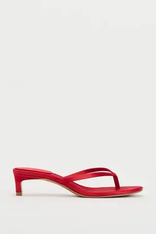 Red kitten-heel thong sandals