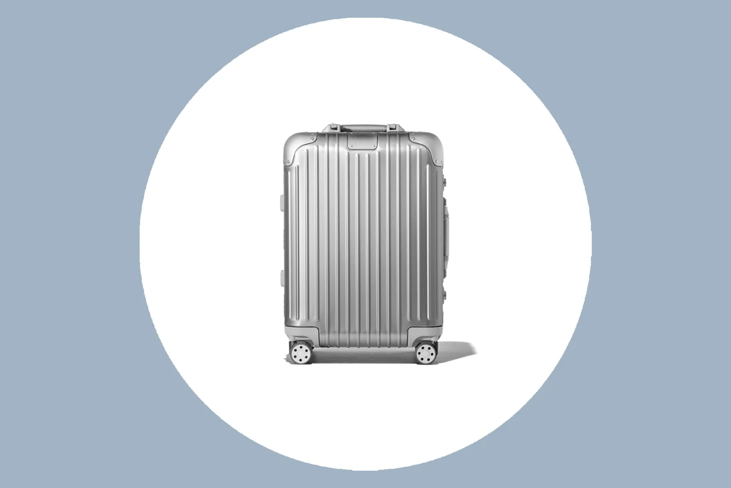 Rimowa Original Cabin Carry On in Silver in a white circle on gray background