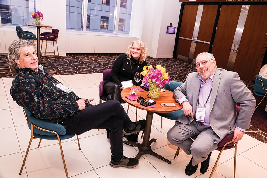 Lawrence Hess (right) at the recent Plumb Club Symposium with Je Weiss and Tracy Lewis of Glennpeter Jewelers in Albany.