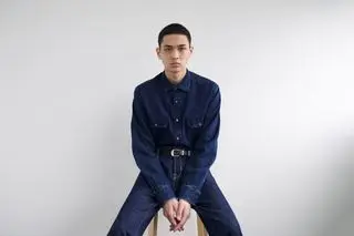 Utilitarian and Workwear-inspired S/S 2024 Men’s Fashion photographed against white wall