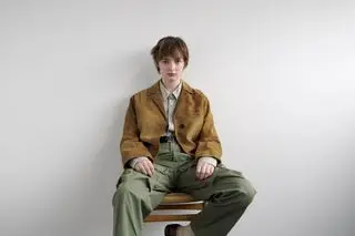 Utilitarian and Workwear-inspired S/S 2024 Men’s Fashion photographed against white wall