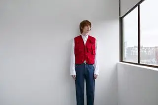 Utilitarian and Workwear-inspired S/S 2024 Men’s Fashion photographed against white wall