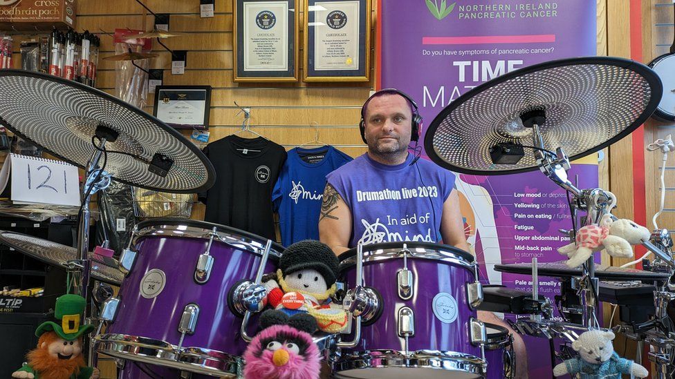 Lisburn man sets drumming world record in memory of partner