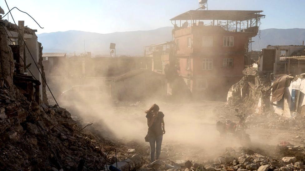 Families in Turkey’s quake cities battle dust and rubble six months on