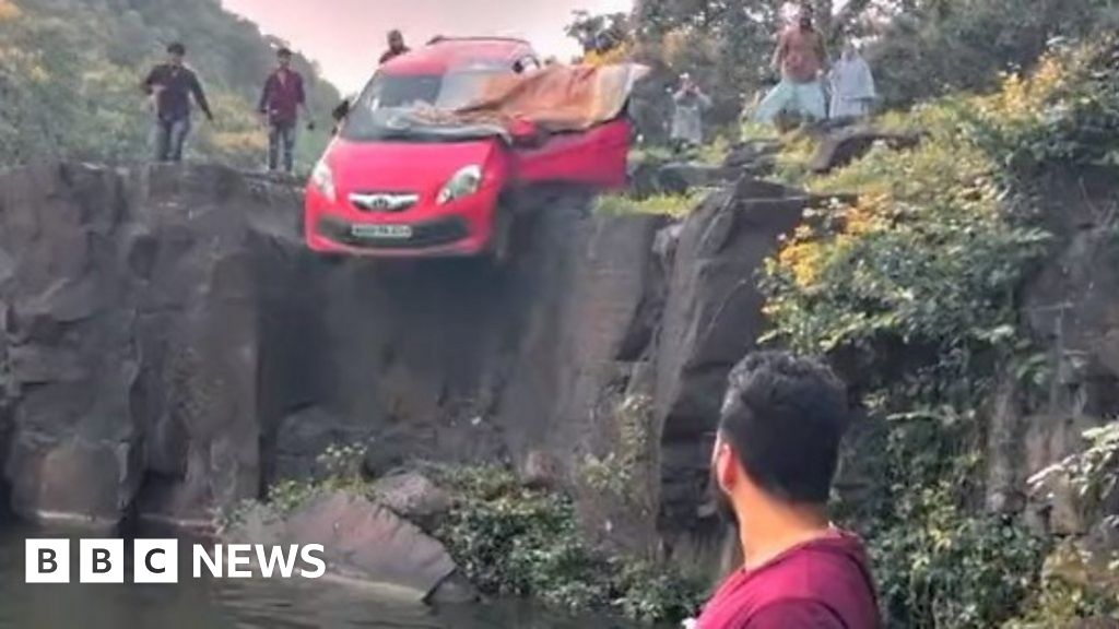 Terrifying moment car falls into India waterfall pool