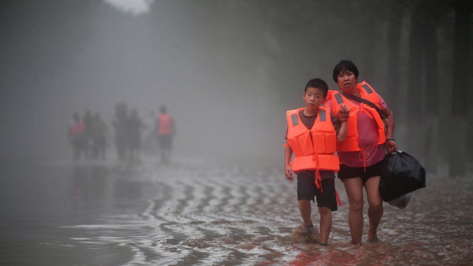 China floods: The families torn apart by ‘huge, furious waves’