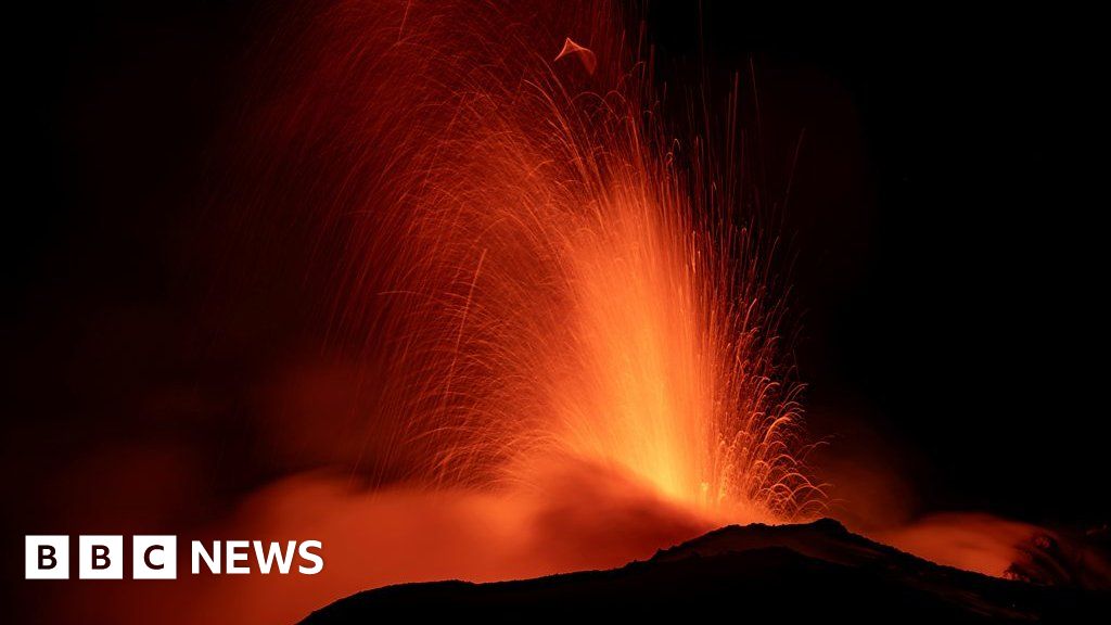 Stunning scenes as Mount Etna erupts at night