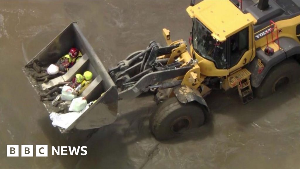 Front loader scoops up flood victims in Coachella Valley