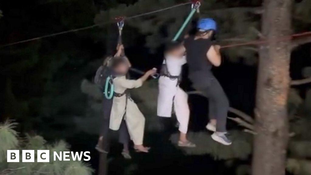 Watch: Children saved in night time zip line rescue