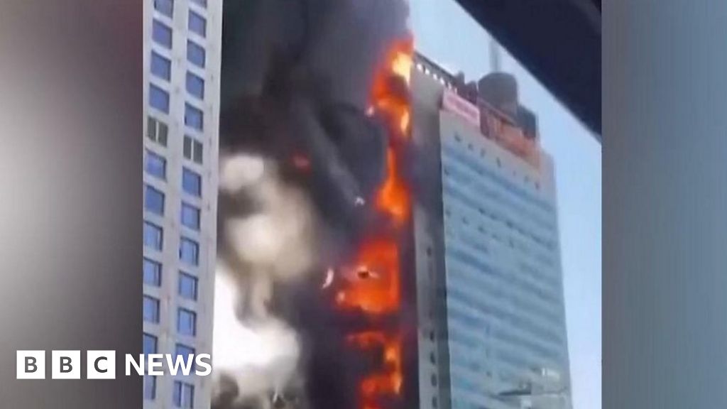 Huge fire rages in China office building