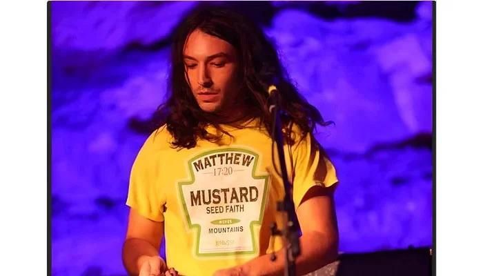 Ezra Miller’s Surprising Matisyahu Stage Presence Raises Cosmetic Curiosity