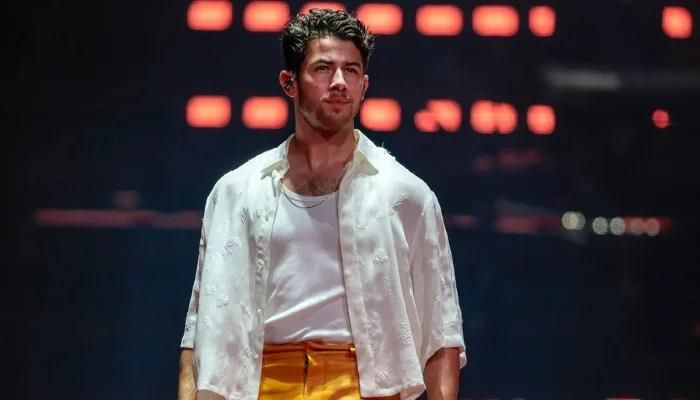 Nick Jonas Sternly ‘Stops’ Fans Who Throw Items Onstage