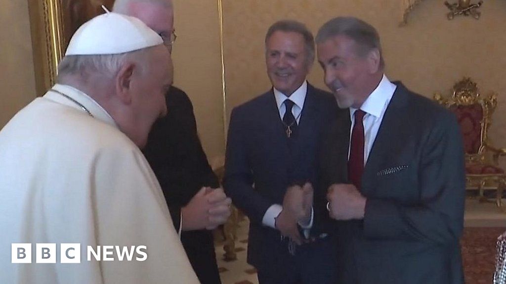 Sylvester Stallone shadow boxes with the Pope