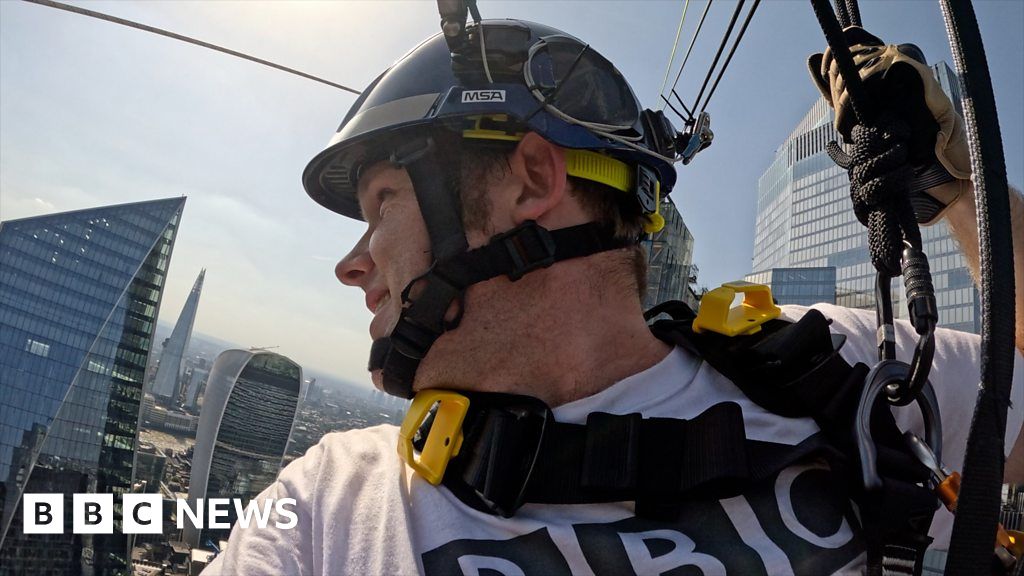 BBC reporter zip wires between London skyscrapers