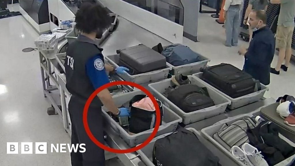 CCTV shows airport staff allegedly stealing from bags