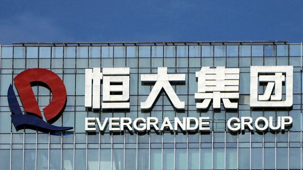 China police detain staff at Evergrande wealth unit