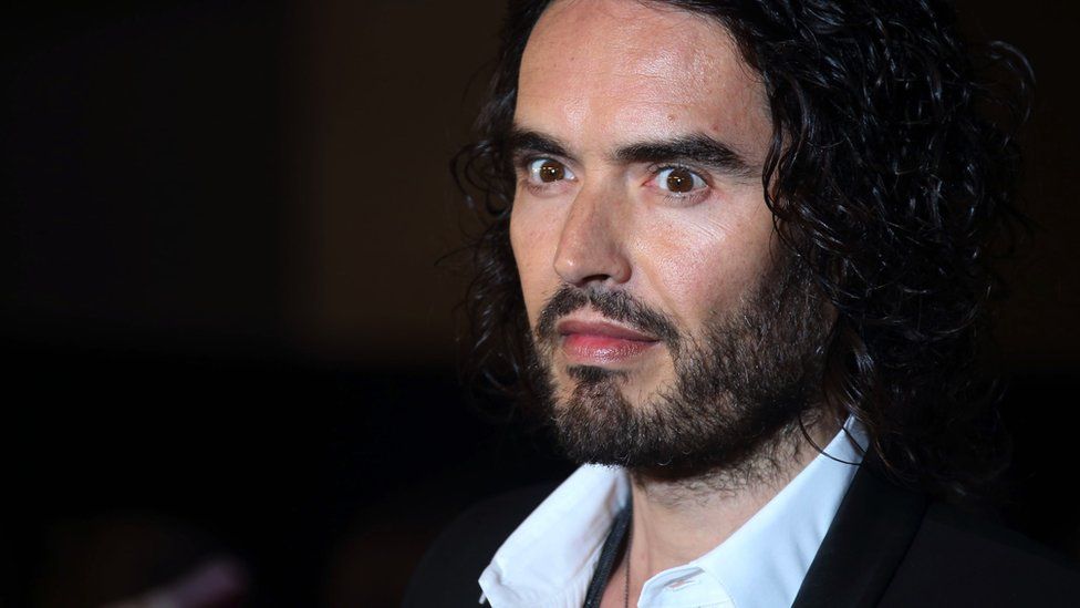 Woman says Russell Brand exposed himself to her then laughed about it on Radio 2 show